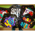 Five colorful birthday balloons with bold text and confetti graphics