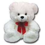 White teddy bear with a red ribbon bow