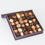 Box of assorted chocolates in a divided gift box