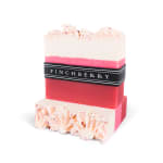 Stacked pink and white soap bars with a Finchberry label