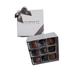 Box of assorted chocolates with a ribboned lid