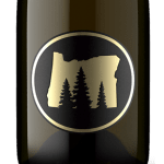 A circular logo with a gold state outline and pine trees on a dark background