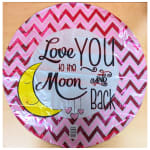 Round pink foil balloon with "Love You to the Moon and Back" text