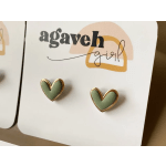 Heart-shaped stud earrings on a card labeled "agaveh girl"