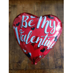 Red heart-shaped balloon with "Be My Valentine" text