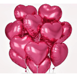 Cluster of metallic pink heart-shaped balloons