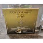 Framed yellow card with a bee illustration and text