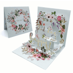 Pop-up floral greeting card with pastel flowers and "It's a good day to be happy" text