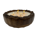 Wooden bowl candle with four lit wicks