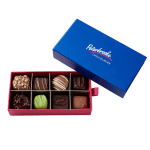 Rectangular red box of assorted chocolates with a blue Peterbrooke lid beside it