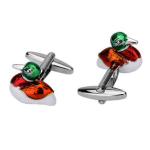Pair of duck-shaped cufflinks with green, red, and orange enamel