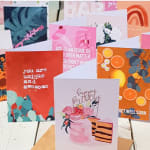 Assorted greeting cards with floral and birthday designs