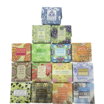 Assorted decorative soap bars in colorful floral-patterned boxes