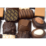 Assorted chocolate truffles and candies in a box
