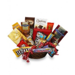 Basket of assorted candy bars tied with red ribbon