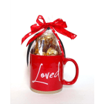 Red mug gift set with chocolates and a ribbon bow