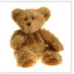 Brown plush teddy bear sitting against a white background