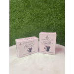 Two pink boxes of sea moss herbal soap on a white surface