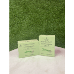 Two lemongrass soap boxes on a pink surface