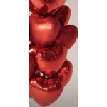 Cluster of red heart-shaped balloons