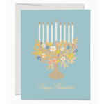 Hanukkah card with a menorah and floral design