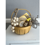 Gift basket with cookies, honey jars, and decorative dried accents
