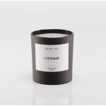 Black scented candle in a glass jar with a white label