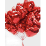 Cluster of red heart-shaped balloons tied together