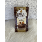 Ferrero Rocher milk chocolate bar package on a white fur surface