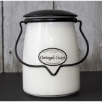 White jar candle with black metal handle and lid