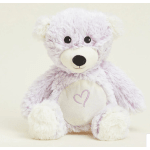Plush white teddy bear with a pink heart on its chest