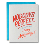 Anniversary card with red lettering on a white front and blue backing