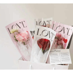 Wrapped bouquets with roses and orchids in pink and white packaging