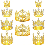 Set of gold decorative crowns with faux jewels on a white background
