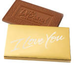 Two chocolate bars, one wrapped in gold and one in brown.