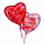 Two heart-shaped red and pink balloons with love messages