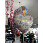 Heart-shaped Mother's Day balloons with floral prints and pink accents