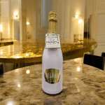Bottle of Belaire Rare Luxe sparkling wine on a marble table