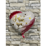 Heart-shaped balloon with "I love you" text on a stone wall background