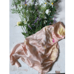 Loose bouquet of white and purple flowers with a pink satin wrap
