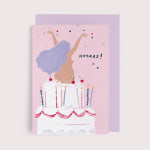 Illustrated birthday card with a cake and the word "Hooray!"