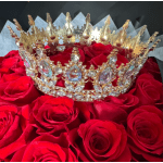 Red roses topped with a jeweled crown