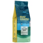 Bag of Door County Coffee Highlander Grogg ground medium roast with coastal-themed design.