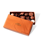Box of assorted chocolates with the lid partially open
