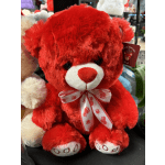 Red plush teddy bear with a pink paw-print ribbon