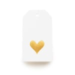 White gift tag with a gold heart