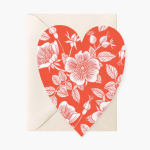Heart-shaped card with red and white floral print
