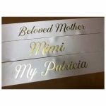 Three memorial name ribbons reading Beloved Mother, Mimi, and My Patricia