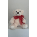White teddy bear with a red ribbon bow
