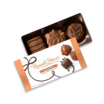Box of assorted chocolate candies in a plastic tray